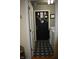 Functional laundry room with modern washer and dryer and stylish floral tiled floors at 7357 Lake Lakota Dr, Indianapolis, IN 46217