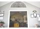 Cozy living room featuring decor art and open views into the kitchen at 7357 Lake Lakota Dr, Indianapolis, IN 46217