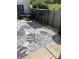 Outdoor patio featuring tall table, patio chairs and a stylish area rug at 7357 Lake Lakota Dr, Indianapolis, IN 46217