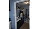 Walk-in closet featuring ample storage and a built-in changing table for maximum convenience at 7357 Lake Lakota Dr, Indianapolis, IN 46217