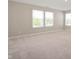 Bright bedroom with three large windows allowing natural light at 7510 Hillway Dr, Camby, IN 46113