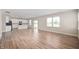 Spacious living area featuring modern kitchen with an island and lots of natural light at 7510 Hillway Dr, Camby, IN 46113