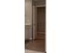 Neutral walk-in closet featuring wire shelving and tile flooring, conveniently located near the bathroom at 7510 Hillway Dr, Camby, IN 46113