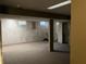 Unfinished basement featuring carpeting, support beams, and windows for natural light at 7667 Madden Ln, Fishers, IN 46038