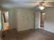 Bedroom with neutral walls, carpet floors, and access to the bathroom and hallway at 7667 Madden Ln, Fishers, IN 46038