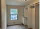 Bedroom featuring a window and a closet with built-in shelving at 7667 Madden Ln, Fishers, IN 46038