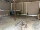 Spacious garage with workbench offering room for parking and projects at 7667 Madden Ln, Fishers, IN 46038