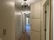 Hallway featuring built in storage and chandelier lighting at 7667 Madden Ln, Fishers, IN 46038
