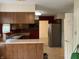Spacious kitchen with linoleum floors and wooden cabinets at 7667 Madden Ln, Fishers, IN 46038