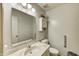 Bathroom features a single sink, mirrored vanity and toilet at 7724 Eagle Valley Pass, Indianapolis, IN 46214