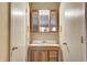 Bathroom featuring a vanity with sink, cabinet, and a mirror at 7724 Eagle Valley Pass, Indianapolis, IN 46214