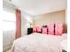Bright bedroom with large window, bed, and closet at 7724 Eagle Valley Pass, Indianapolis, IN 46214