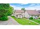 Inviting two-story home with a well-manicured lawn and charming curb appeal at 7724 Eagle Valley Pass, Indianapolis, IN 46214