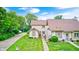 Beautiful two-story home with well-kept lawn, and lush trees surrounding at 7724 Eagle Valley Pass, Indianapolis, IN 46214