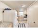 Well-lit kitchen featuring modern appliances, granite counters, and tile flooring at 7724 Eagle Valley Pass, Indianapolis, IN 46214
