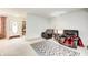 Open-concept living room featuring comfortable seating and view of the foyer at 7724 Eagle Valley Pass, Indianapolis, IN 46214