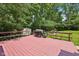 Spacious red stained back deck perfect for grilling and entertaining at 7831 Bayridge Dr, Indianapolis, IN 46236