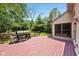 Spacious back deck perfect for grilling and entertaining with lush green backyard at 7831 Bayridge Dr, Indianapolis, IN 46236