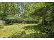 Lush green backyard perfect for outdoor activities at 7831 Bayridge Dr, Indianapolis, IN 46236