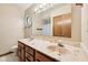 Standard bathroom featuring a double sink vanity with ample mirror at 7831 Bayridge Dr, Indianapolis, IN 46236