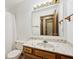 Standard bathroom featuring a single sink vanity with ample mirror at 7831 Bayridge Dr, Indianapolis, IN 46236