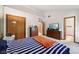 Bedroom with neutral carpet, storage chests and two dressers at 7831 Bayridge Dr, Indianapolis, IN 46236