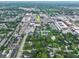 Aerial view of Carmel downtown, showcasing the city's layout with its mix of buildings, streets, and green spaces at 80 Monon Blvd, Carmel, IN 46032