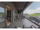 Relaxing outdoor balcony with comfortable seating and pleasant views of the neighborhood at 80 Monon Blvd, Carmel, IN 46032