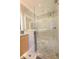 Luxurious shower with glass enclosure, mosaic tile floor, and multiple shower heads at 80 Monon Blvd, Carmel, IN 46032