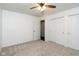 Bedroom featuring double closets and a ceiling fan at 802 Lawrence Ave, Indianapolis, IN 46227