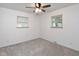 Bedroom with neutral carpet, white walls, and natural light at 802 Lawrence Ave, Indianapolis, IN 46227