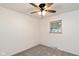 Bedroom with neutral carpet, white walls, and natural light at 802 Lawrence Ave, Indianapolis, IN 46227