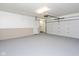 Clean, spacious garage with a well-lit area at 802 Lawrence Ave, Indianapolis, IN 46227