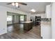 Contemporary kitchen with stainless steel appliances and a kitchen island adjacent to living room at 802 Lawrence Ave, Indianapolis, IN 46227