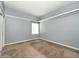 Neutral bedroom with carpet, clean white trim, and natural light at 8247 Cape N Dr, Indianapolis, IN 46256