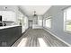 Bright and modern living space with wood flooring and neutral paint tones at 8247 Cape N Dr, Indianapolis, IN 46256