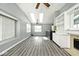 Spacious living room with vaulted ceilings, skylights, and a modern design at 8247 Cape N Dr, Indianapolis, IN 46256