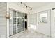 The sunroom offers sliding glass door access and a view of the kitchen at 8247 Cape N Dr, Indianapolis, IN 46256
