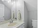 Cozy bathroom features neutral color palette, and a traditional vanity and sink at 8313 Tequista Cir, Indianapolis, IN 46236