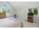 Bright bedroom with lots of light features large window and natural colored walls at 8313 Tequista Cir, Indianapolis, IN 46236