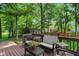 A relaxing deck furnished with outdoor seating and decorative potted plants at 8313 Tequista Cir, Indianapolis, IN 46236