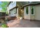 Back of the house with a deck, stairs, and large windows at 8313 Tequista Cir, Indianapolis, IN 46236