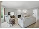 Inviting living room with a fireplace, comfortable seating, and neutral decor at 8313 Tequista Cir, Indianapolis, IN 46236