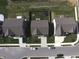 Aerial view of homes featuring driveways and backyards with fences and lawns at 8969 Faulkner Dr, Indianapolis, IN 46239