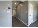 Hallway with grey walls and white trim at 8969 Faulkner Dr, Indianapolis, IN 46239