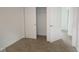 Cozy carpeted bedroom featuring closet space and neutral walls, offering a blank canvas at 9516 Bauhaus Way, Indianapolis, IN 46240