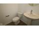 Cozy powder room featuring neutral walls and a pedestal sink at 9516 Bauhaus Way, Indianapolis, IN 46240