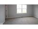 Bedroom featuring neutral walls and natural light from the exterior window at 9520 Bauhaus Way, Indianapolis, IN 46240