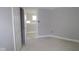 Bedroom with neutral walls, white trim, a closet, and a window offers a cozy retreat at 9520 Bauhaus Way, Indianapolis, IN 46240