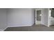 Bedroom featuring neutral walls, large closet, and a view into the upstairs hall bathroom at 9520 Bauhaus Way, Indianapolis, IN 46240